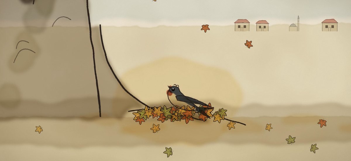 Telli, a young swallow, resting on a pile of autumn leaves at the foot of the plane tree